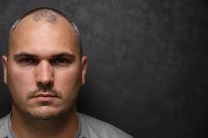 A Baltimore police officer faces six charges after Harford County investigators say DNA linked him to the on-duty rape of a woman in Edgewood.