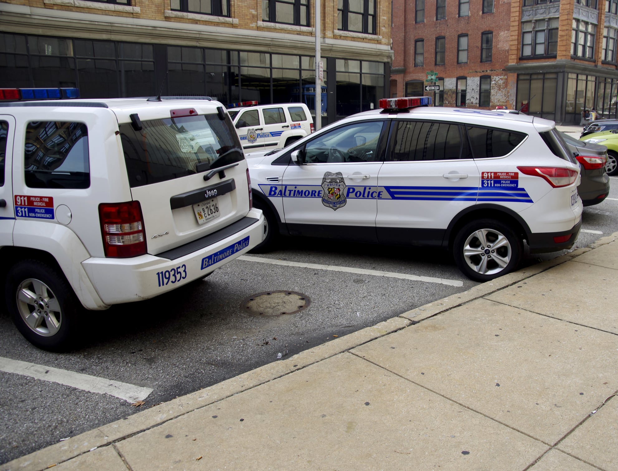 Three 14-year-olds arrested after police recover carjacked vehicle and loaded gun in baltimore Baltimore,maryland police vehicles. City police cars outside baltimore police headquaters - by kevin duke