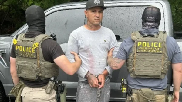ICE officers arrested Brazilian fugitive Maycon Souto Dos Reis at Westborough District Court in Massachusetts during a targeted enforcement operation after authorities said he was wanted for an aggravated murder conviction in Brazil.