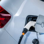 Electric vehicles and electric vehicle charging stations