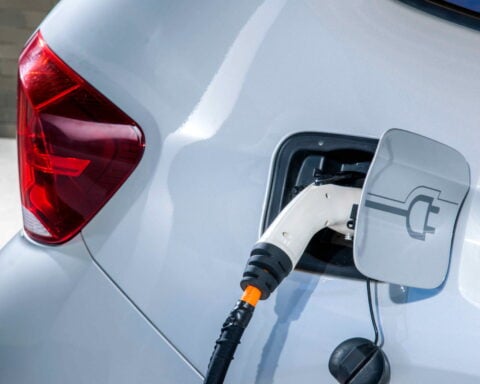 Electric vehicles and electric vehicle charging stations