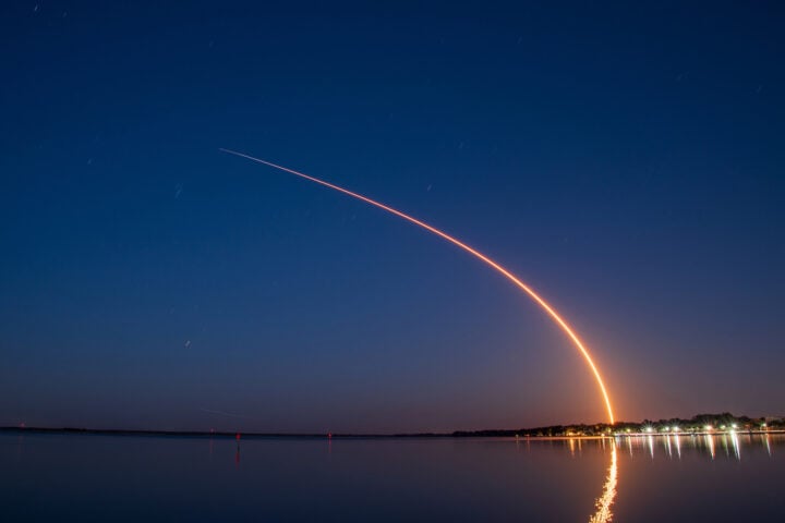 Photo Caption: A SpaceX Falcon 9 rocket launches from Cape Canaveral on a Starlink mission, creating a bright plume that can sometimes be seen from the northeastern United States.