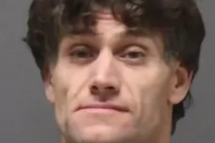 Photo caption: Lakewood police said a routine patrol encounter with a disabled vehicle resulted in a narcotics arrest near Ridge Avenue and Lanes Mill Road.