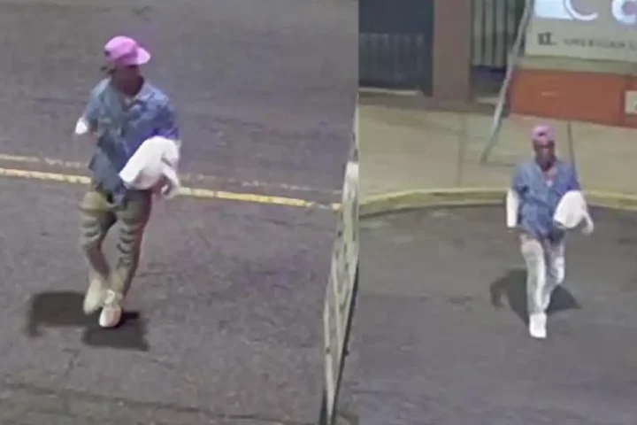 Newark police are searching for a suspect accused of robbing a woman of her cellphone while she was taking out the trash outside her apartment.