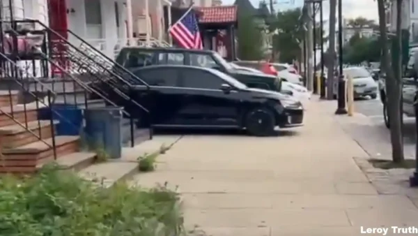 Vehicles parked on a Union City residential block partially and, in some cases, completely obstruct public sidewalks despite state law and local ordinances prohibiting sidewalk parking.