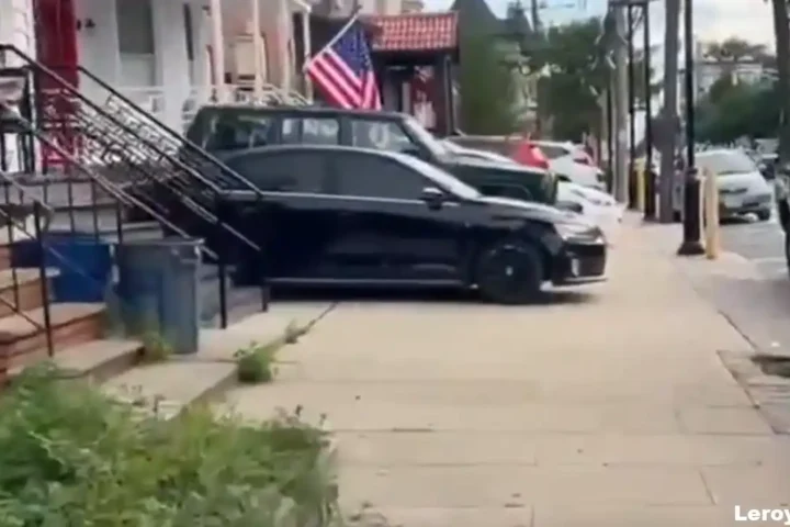 Vehicles parked on a Union City residential block partially and, in some cases, completely obstruct public sidewalks despite state law and local ordinances prohibiting sidewalk parking.