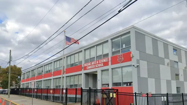 A federal judge ruled that portions of a former Passaic charter school teacher's discrimination and retaliation lawsuit against iLearn Schools and Passaic Arts & Science Charter School may proceed while dismissing other claims.