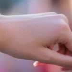 A federal appeals court backed New Hampshire parents challenging sanctions for wearing pink “XX” wristbands at a girls soccer game.