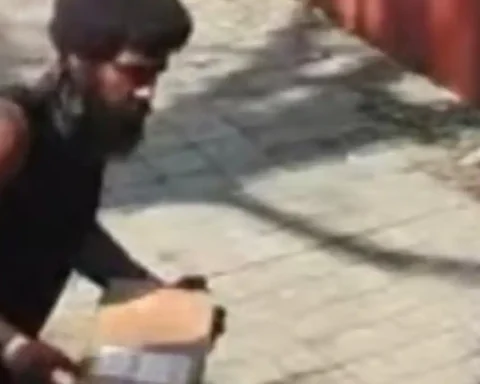 Newark police are searching for a suspected porch pirate who was caught on surveillance video stealing a desktop computer just minutes after it was delivered by FedEx.
