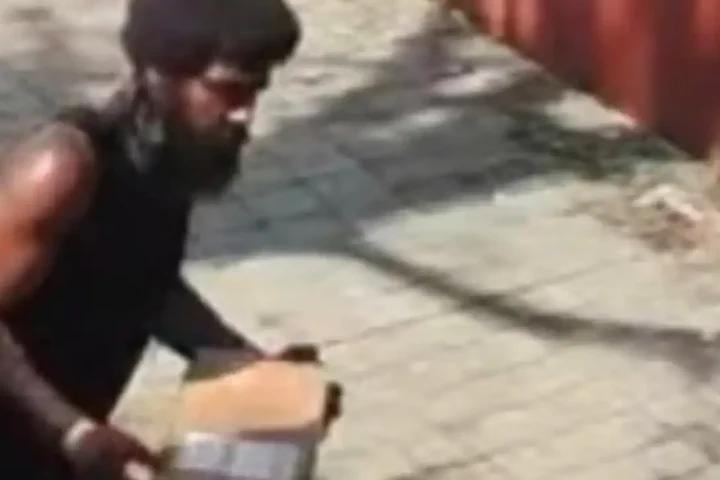 Newark police are searching for a suspected porch pirate who was caught on surveillance video stealing a desktop computer just minutes after it was delivered by FedEx.