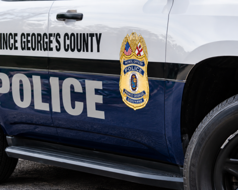 A Bowie woman was killed after police say a suspect fled a traffic stop, crossed the center line and crashed into her car Wednesday afternoon.