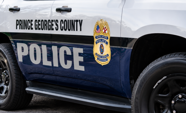 A Bowie woman was killed after police say a suspect fled a traffic stop, crossed the center line and crashed into her car Wednesday afternoon.