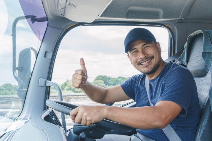 Professional Truck Driver Driving Tractor Trailer