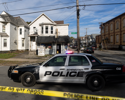 Schenectady police arrested Isaac A. Holmes after a foot chase, saying officers recovered cocaine and a loaded firearm from the 45-year-old suspect. Photo illustration by SNN