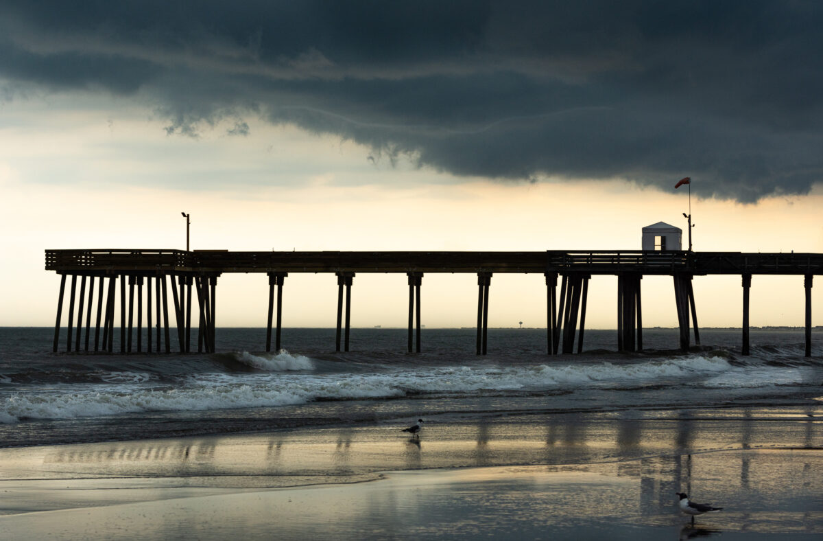 Shore point pier. Storm clouds hover over the fishing pier at Ocean City, NJ
