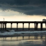 Shore point pier. Storm clouds hover over the fishing pier at Ocean City, NJ