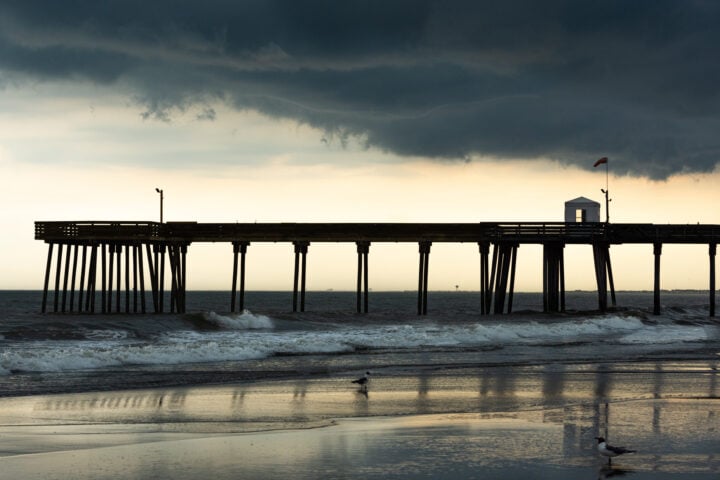 Shore point pier. Storm clouds hover over the fishing pier at Ocean City, NJ