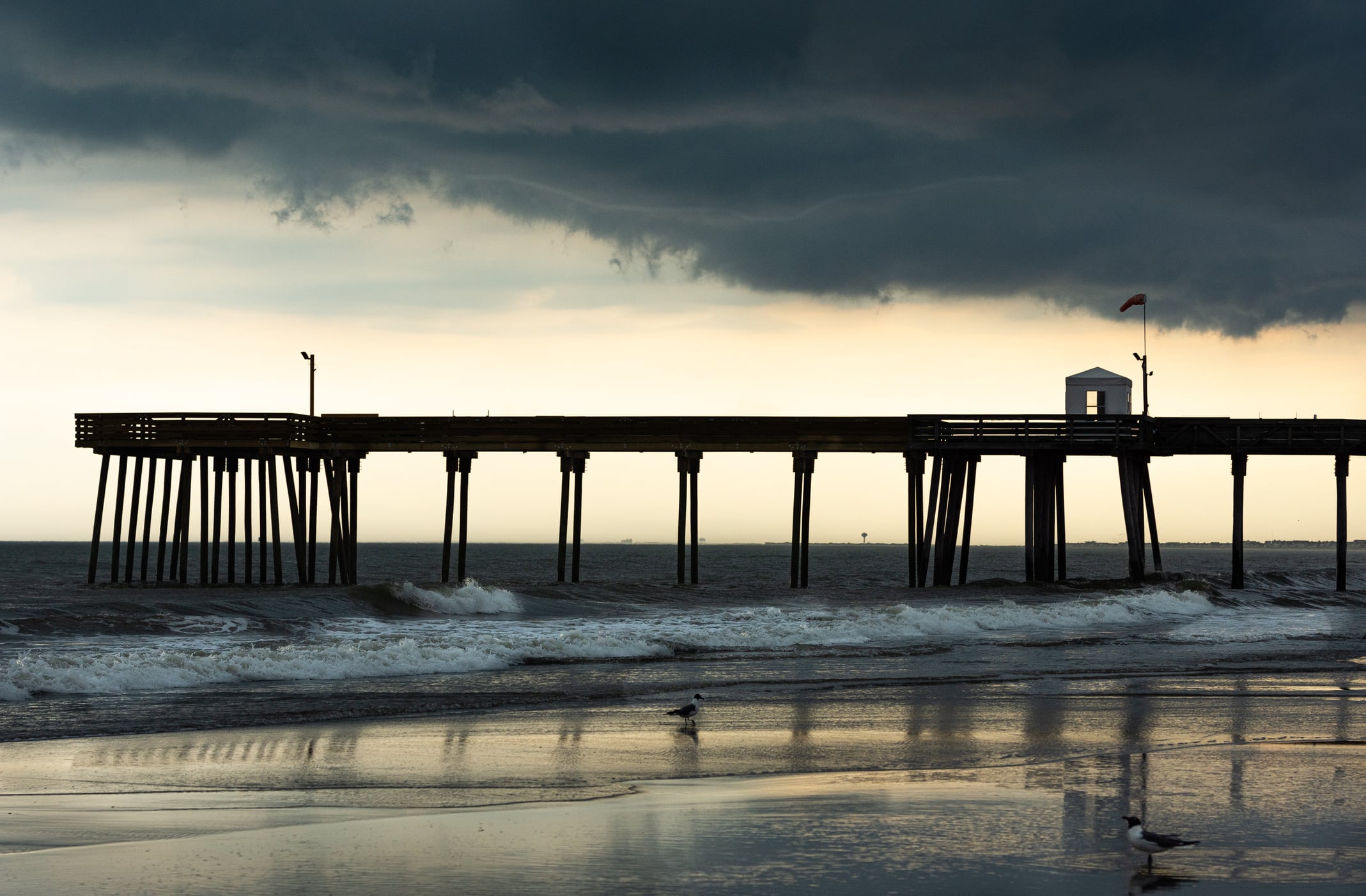 Shore point pier. Storm clouds hover over the fishing pier at ocean city, nj
