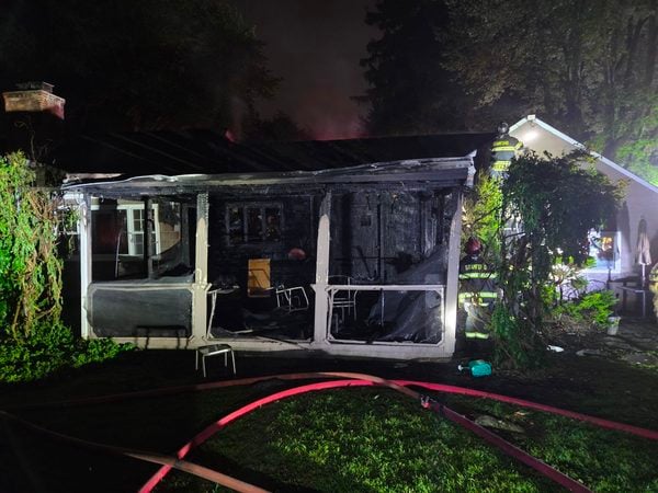 A North Stamford house fire displaced three residents and their dog Monday after flames spread through the kitchen, family room and attic before crews stopped it.