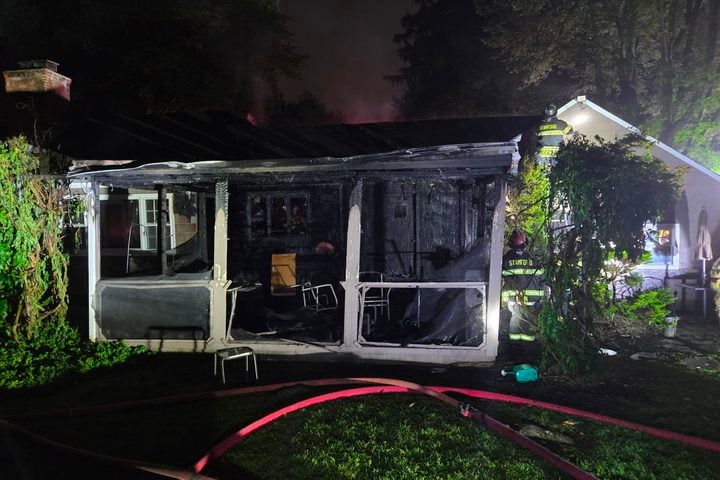 A North Stamford house fire displaced three residents and their dog Monday after flames spread through the kitchen, family room and attic before crews stopped it.