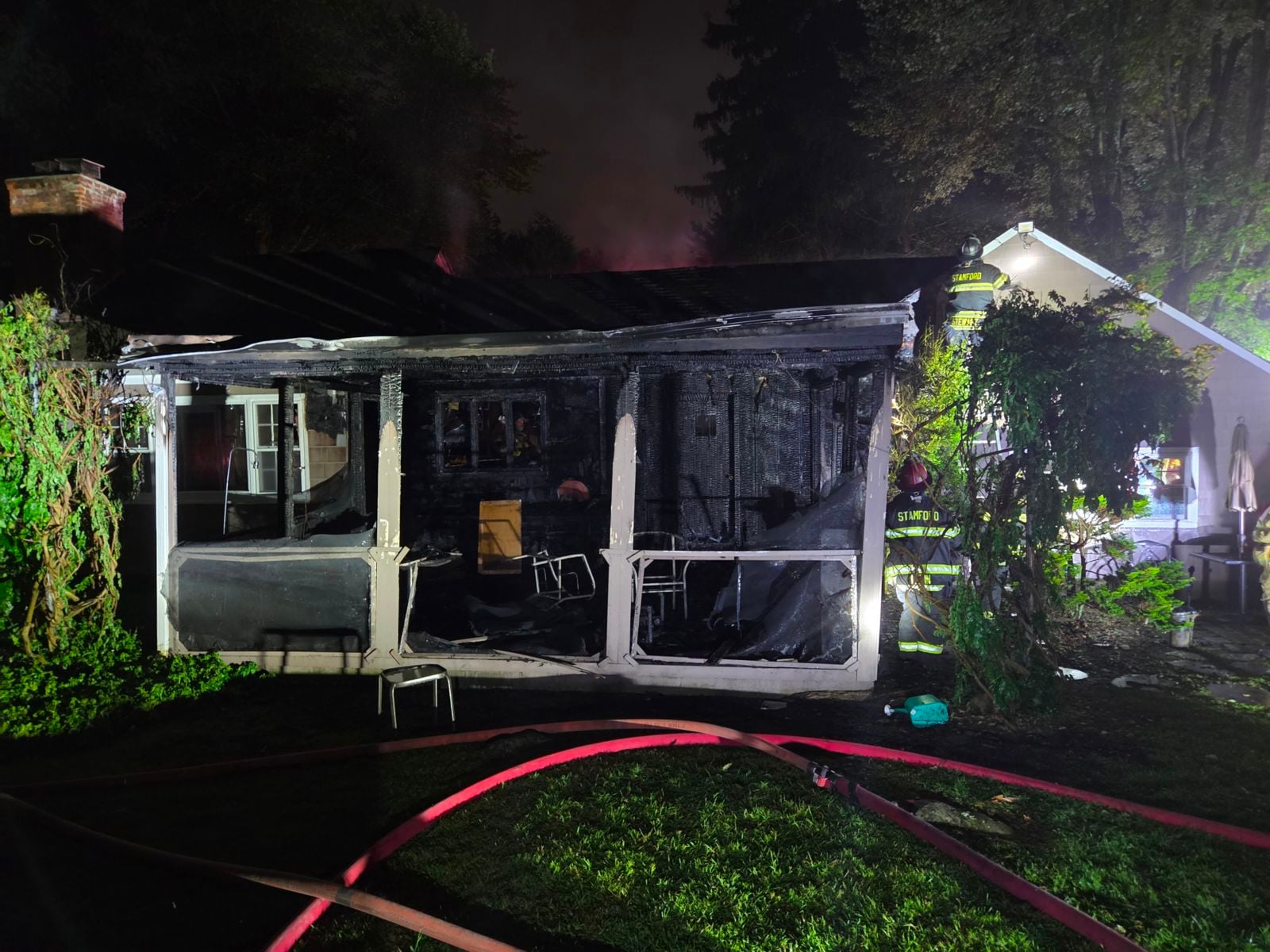 A north stamford house fire displaced three residents and their dog monday after flames spread through the kitchen, family room and attic before crews stopped it.