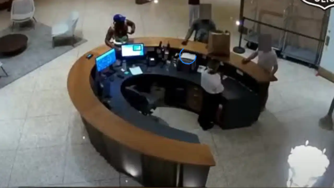 Photo caption: surveillance images released by the newark police division show the suspect wanted in connection with an aggravated assault involving a flower pot inside an apartment building on kenneth a. Gibson boulevard.