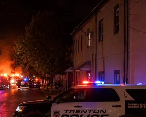 Photo Illustration Caption: Firefighters battled a deadly three-alarm house fire on Hewitt Street in Trenton that claimed the lives of two children and injured two firefighters.