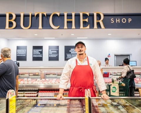 Photo Caption: Somerset County Commissioner Sara Sooy joined local officials, business owners and residents Friday for the grand opening of Whole Foods Market at Montgomery Promenade in Skillman.