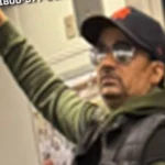 Police are searching for a man accused of exposing himself and committing a lewd act aboard a Queens-bound R train before fleeing at Queens Plaza.