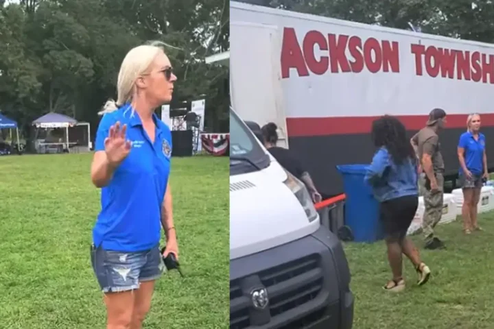 Photo Caption: Jackson Mayor Jennifer Kuhn speaks with an independent journalist during Jackson Day before requesting police assistance during a dispute over public records questions.
