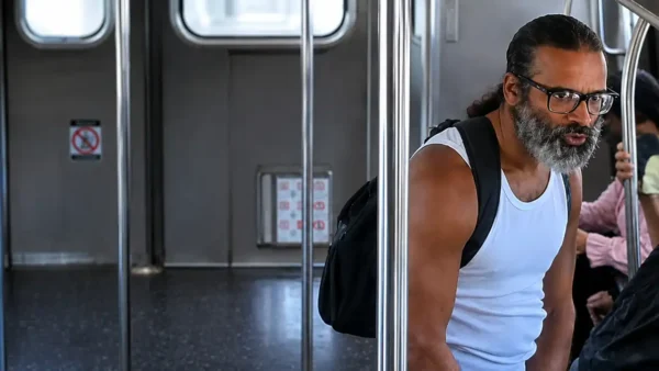Photo Caption: The NYPD released this surveillance image of an unidentified individual wanted in connection with the Aug. 17 robbery of a 35-year-old rider aboard a Queens-bound A train.