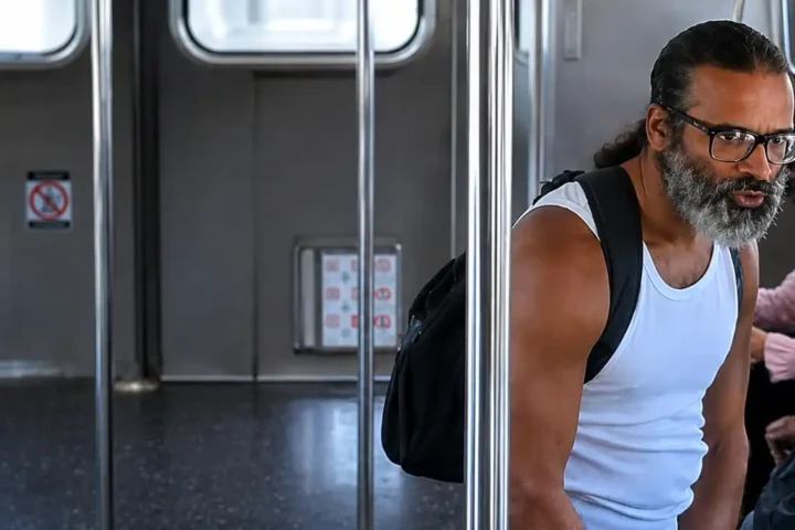 Photo Caption: The NYPD released this surveillance image of an unidentified individual wanted in connection with the Aug. 17 robbery of a 35-year-old rider aboard a Queens-bound A train.