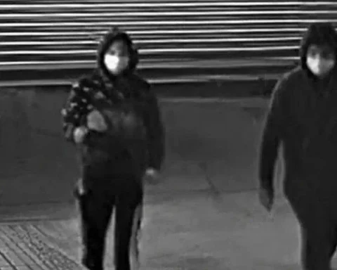 Photo Caption: Surveillance images released by the NYPD show two individuals wanted in connection with the fatal shooting of a 17-year-old inside a building on New Lots Avenue in Brooklyn.