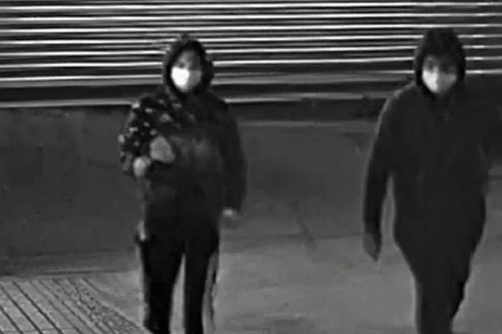 Photo Caption: Surveillance images released by the NYPD show two individuals wanted in connection with the fatal shooting of a 17-year-old inside a building on New Lots Avenue in Brooklyn.