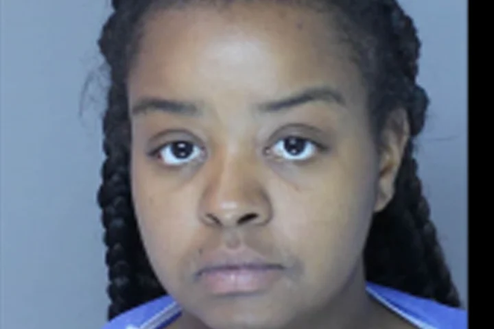 According to investigators, Nolte-Maple is accused of knowing that an acquaintance, identified as Raheem Floyd, used a lighter to burn a small child while the child was unable to move.