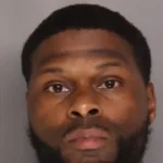 Police arrested Michael Burnett in connection with the fatal shooting of 32-year-old India Johnson on Treeway Court in Baltimore County.