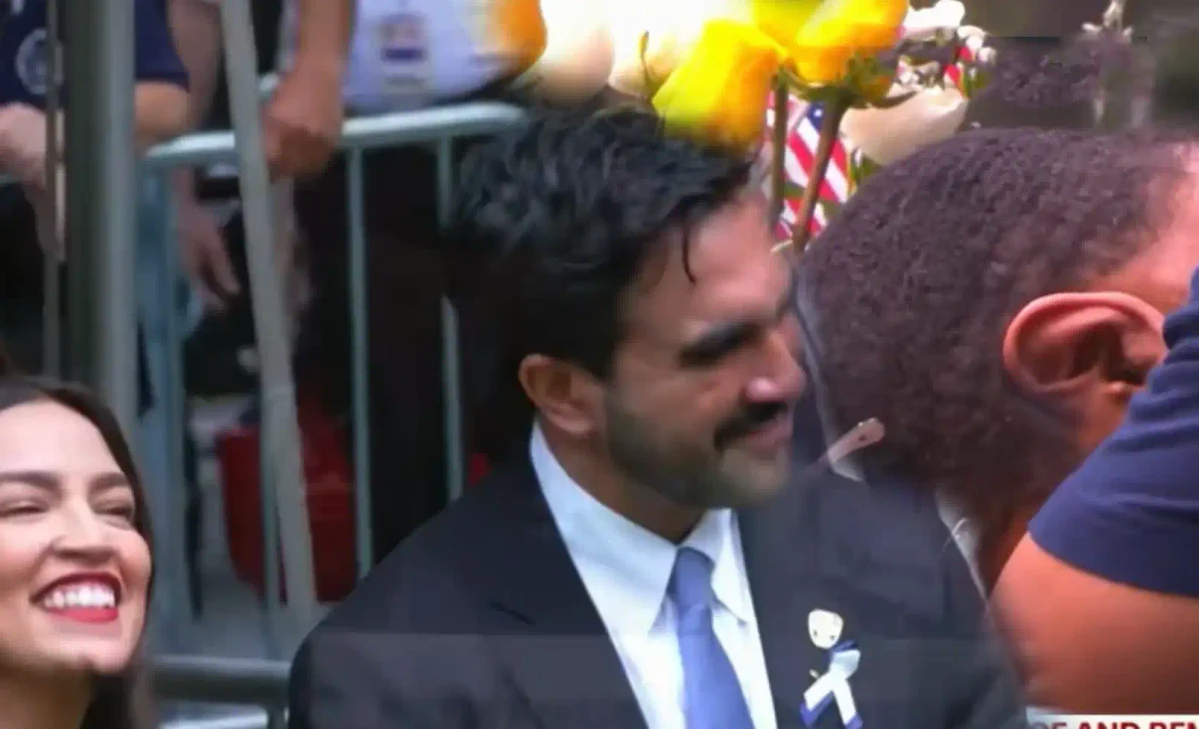 AOC and Mayor Zohran Mamdani face criticism after cameras caught them smiling and appearing to laugh during the 9/11 victims’ name reading.