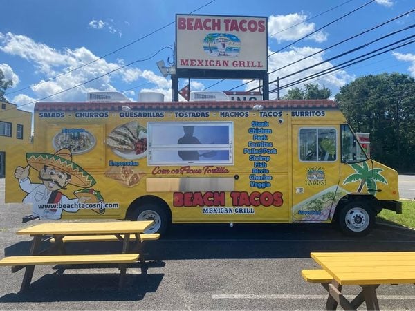 The Beach Tacos truck being offered for sale is a 2022 Ford Step Van with approximately 1,200 miles and a commercial kitchen buildout completed in 2023.