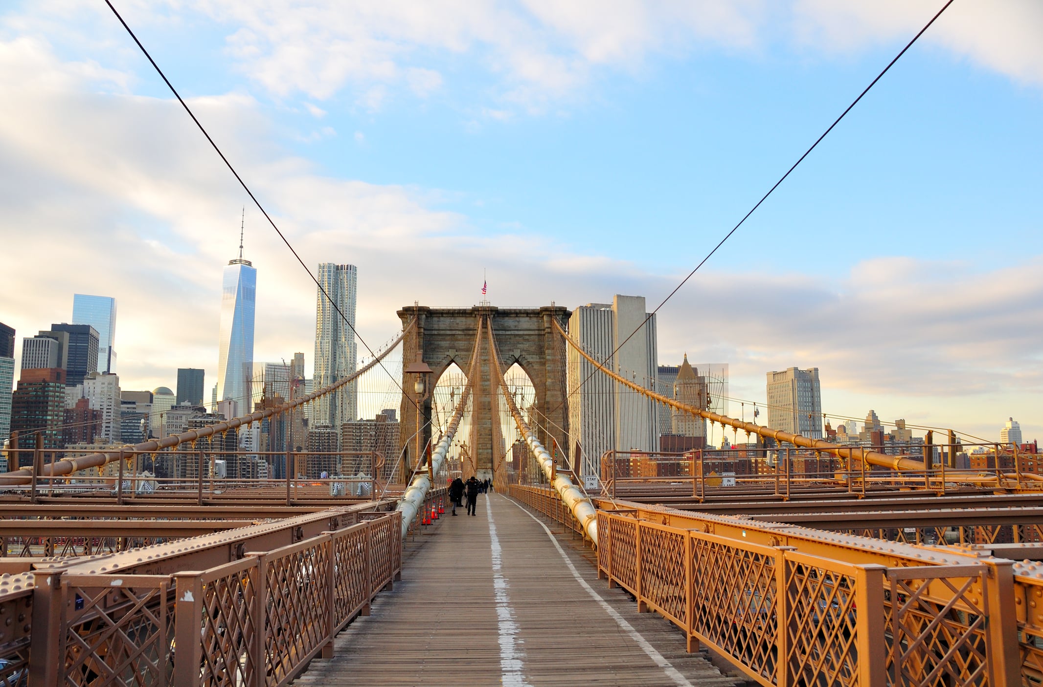 Nypd officers shot a knife-wielding man on the brooklyn bridge early friday, closing parts of the span and snarling the morning commute in nyc.