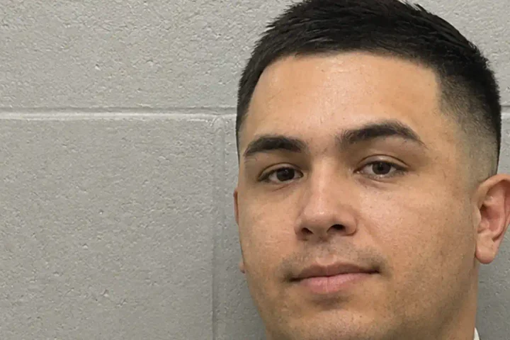 Rockaway Township Police Officer Donald J. Reddin, 34, has been charged with obstruction and conspiracy to distribute a controlled dangerous substance and is suspended without pay, according to the Morris County Prosecutor's Office. Photo Illustration by SNN.