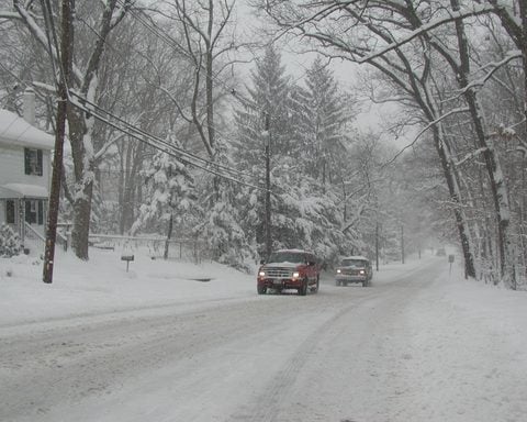 Driving in a snow storm - Photo by Ramon Negron
