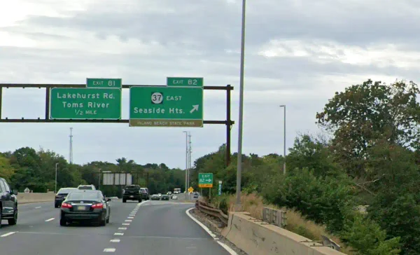 A $509 million parkway overhaul would reshape exits 80–83, add separate exit lanes and new ramps, and remove nearly 36 acres of ocean county forest.