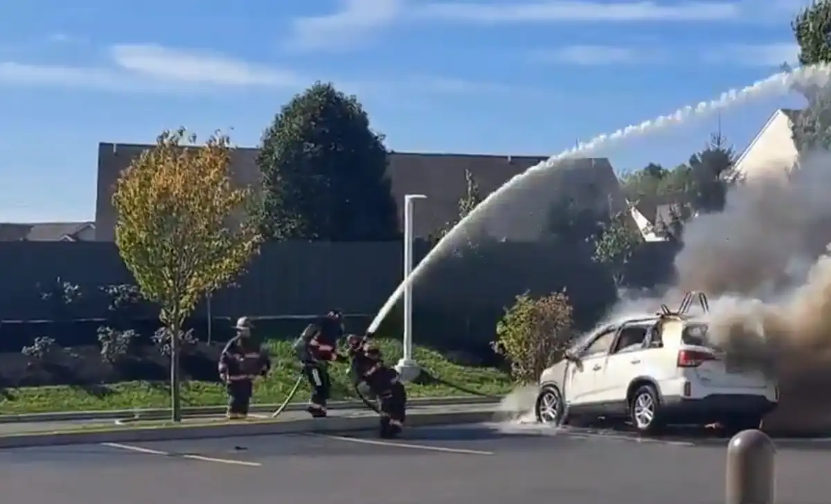 Firefighter battling car fire in Pennslyvania. Screen Capture - X