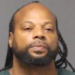 Brick man accused of helping toms river murder fugitive surrenders as shooter douglas cobb remains on the run