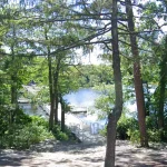 A resident’s complaint about people gathering near Lake Carasaljo echoes a long-running Lakewood dispute that once led officials to remove trees and benches from downtown.