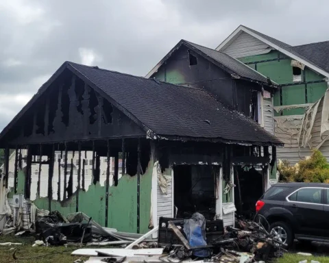 Five people escaped a Denton house fire sparked by discarded smoking materials Sunday, with damage estimated at $300,000 and a family cat still missing.