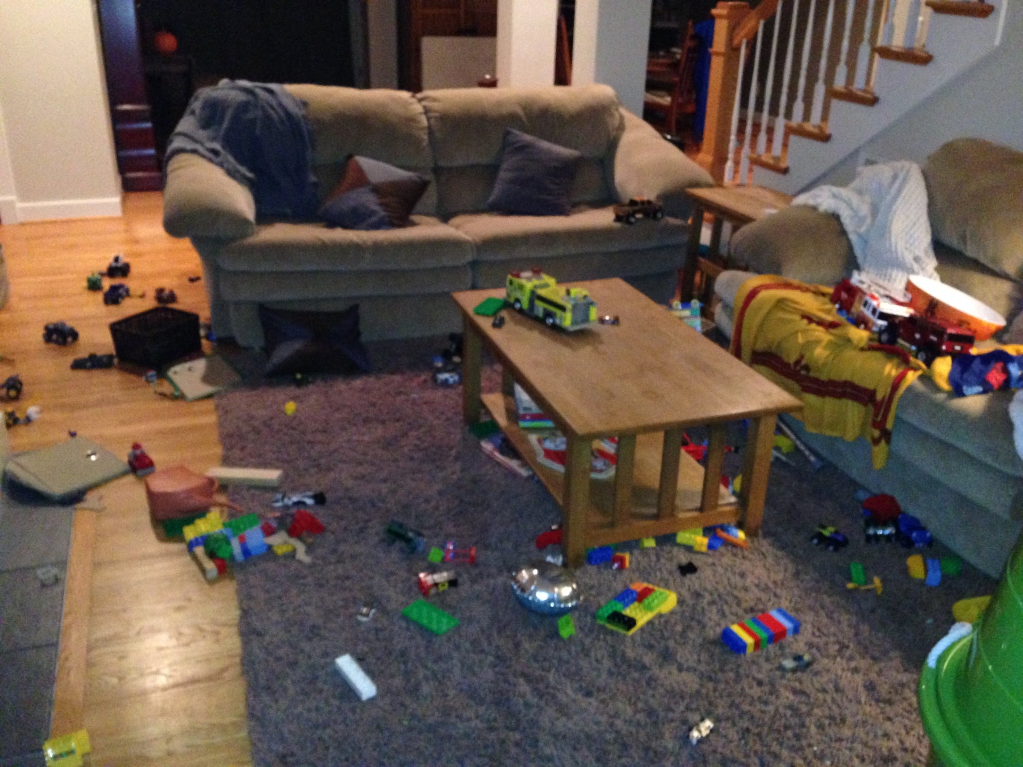 Messy living room. A living room with with toys and clothes all over the place. Photo by carrie seufer.