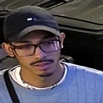 NYPD detectives are searching for a gunman who allegedly robbed a 38-year-old man of a fanny pack containing $2,000 on an early morning in Queens.