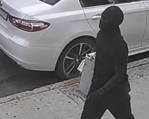 NYPD is searching for a man accused of stealing a 92-year-old man's cellphone and pushing him to the ground during a robbery in Queens.