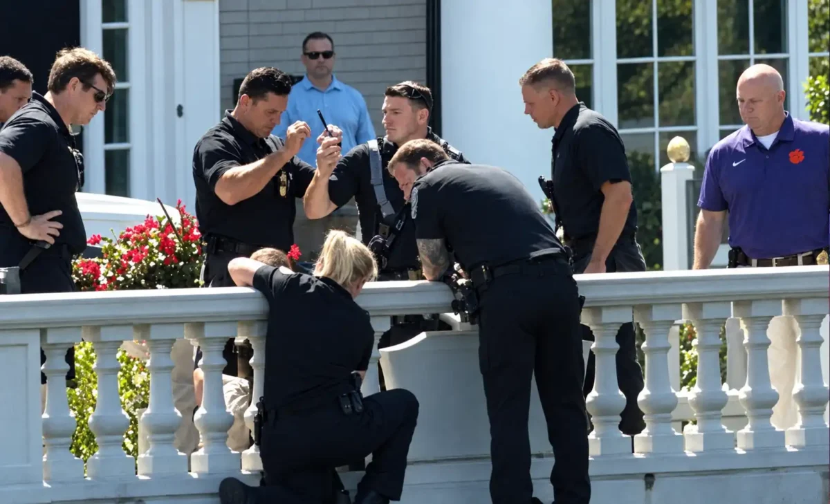 Westfield police officers rescue child trapped between two columns. Photo enhanced for clarity. Original photo in article